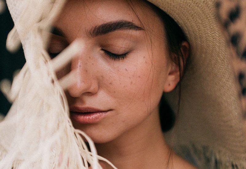 photo-of-woman-wearing-straw-hat-3597101